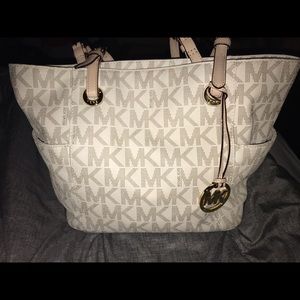 Cream colored Michael Kors Purse